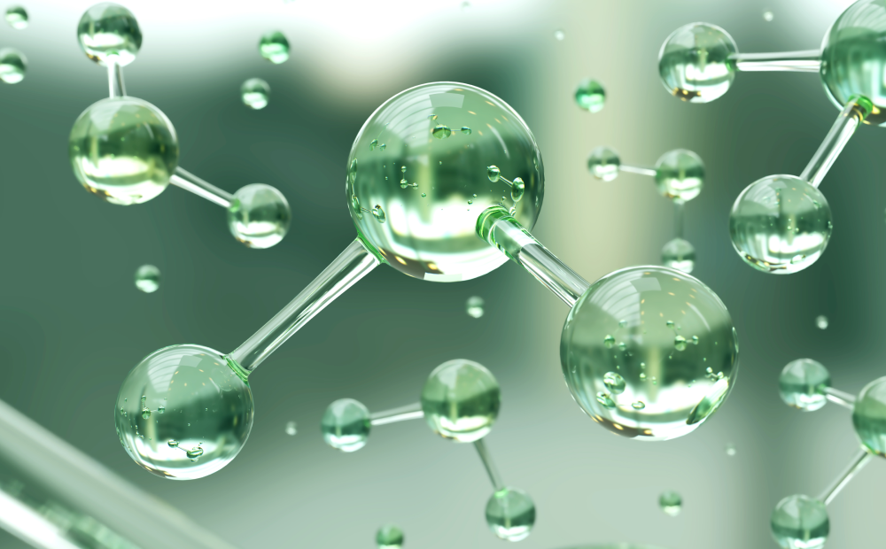 Green hydrogen molecules representing clean energy and sustainable fuel technology.